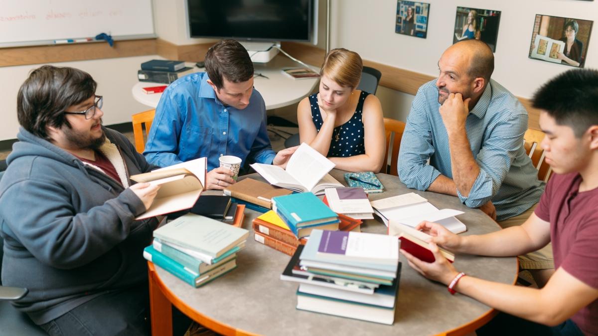 Students sit at lab table